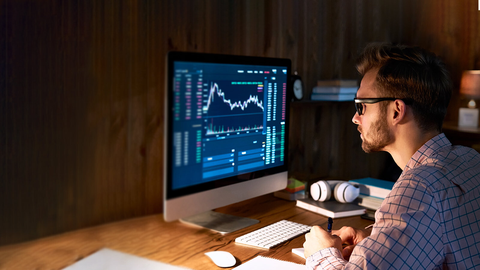 man looking at financial chart